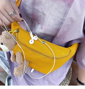 Cute bear canvas chest bag for women, trendy single shoulder crossbody waist bag.