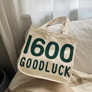 Canvas tote bag for women, stylish casual shoulder handbag with large printed letters daily use