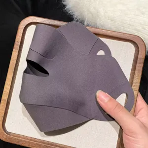 Detail view of the dark grey breathable face mask, showing stretch fabric and 3D contour.