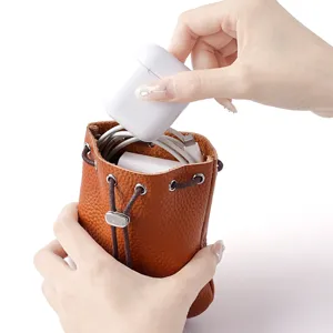 Bolsa de cordón de cuero genuino vintage, monedero portátil y bolsa de joyería.