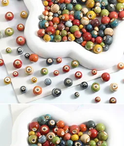 Close up view of colorful glazed ceramic loose beads with large holes for DIY jewelry making.