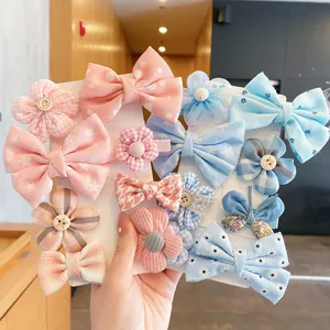 Set di fermagli per capelli per bambini, fiocchi colorati e forcine floreali vista principale.
