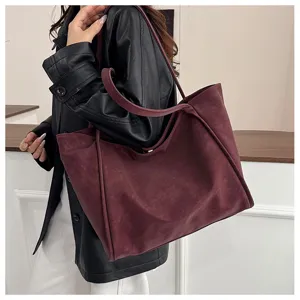 Detailed view of the retro maroon large capacity tote bag, casual shoulder bag style.