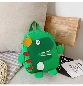 Mignon sac à dos dinosaure pour enfants, cartable vert en tissu Oxford pour la maternelle.
