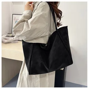 Vintage large capacity black tote bag for women, casual commuting shoulder and underarm bag.