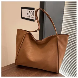 Brown PU leather tote bag large capacity casual commuting shoulder bag minimalist design.
