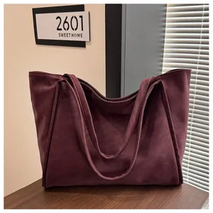 Detailed view of large capacity vintage wine red tote bag for casual daily commute.