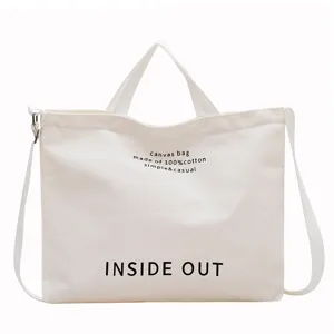 Canvas tote bag with shoulder strap, large capacity casual handbag for daily use and shopping.