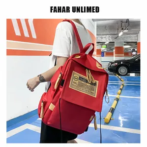 Red oxford backpack detail, large capacity travel computer bag for men and women stylish use.