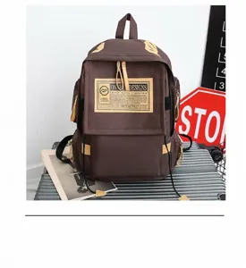 Oxford cloth backpack detail view, featuring durable brown fabric and large capacity design.