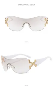 Y2K wrap-around sunglasses for women, futuristic shield sun glasses with rhinestone hinge details.
