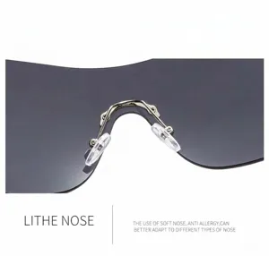 Y2K wrap-around sunglasses detail showing metal nose bridge and comfortable transparent pads.
