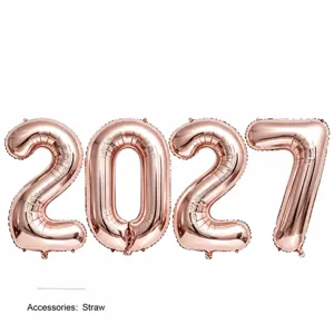 Detail view of 32 inch rose gold number 2027 foil balloons for new year party decoration setup.