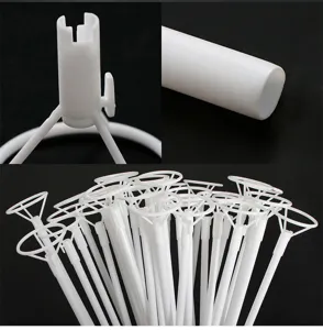 Close-up details of white plastic balloon sticks holders connectors accessories parts display.