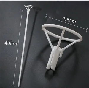 White plastic balloon stick and cup holder detail showing forty centimeter length for party decor.