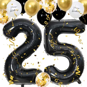 Closeup view of black number 25 foil balloon with gold confetti and happy birthday balloons.