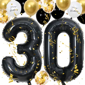 Large 40 inch black number 30 foil balloon set with gold confetti and birthday balloons party.