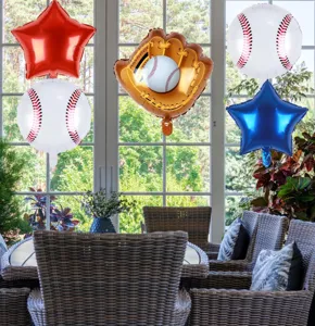 Baseball themed foil balloons hanging in bright indoor window scene for party decor details.