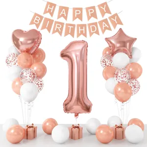 1st birthday party decoration balloon set with rose gold happy birthday banner and number 1 balloon.