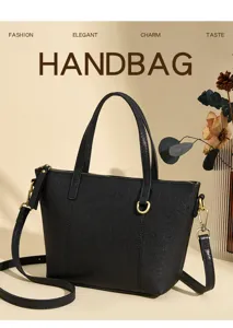 Detailed view of black women handbag with stylish gold hardware and elegant crossbody strap.