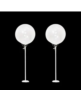 Clear bubble balloon column with white stand base for party decoration and setup.