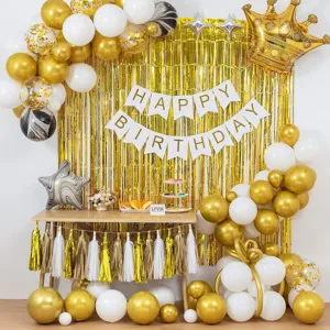 Birthday party balloon decoration set with gold white balloons and crown foil balloon.
