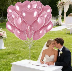 Heart foil balloons detail view showing pink heart balloon cluster setup for party decor.