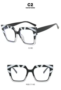 Detailansicht der stilvollen farbblockierten Katzenauge Blaulichtfilter Brille mit geometrischem.