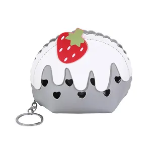 Cute mini strawberry cake coin purse with keychain and heart cutouts for daily use.