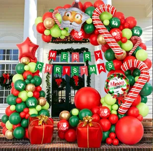 Christmas balloon arch kit with candy cane balloons and banner for holiday party decor.