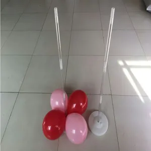 Clear balloon column stand with base and balloons for party and event decoration setup.