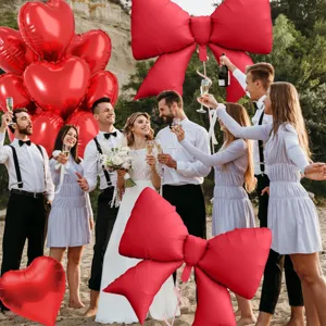 Red bow and heart balloon set for birthday party decorations and romantic outdoor celebrations.
