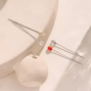 Exquisite crystal hijab pins detail shot, sparkling beads and fine metal pins for decor.