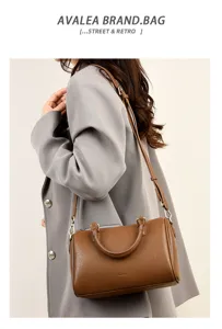 Classic brown leather boston bag, stylish womens single shoulder crossbody handbag.