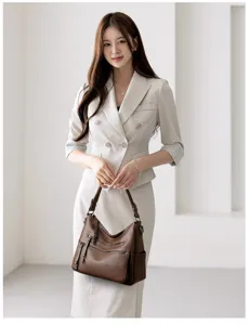 Stylish large capacity brown leather hobo shoulder bag with multi zippers for daily elegant work.