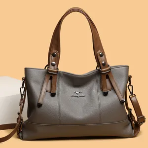 Large capacity women's tote bag, soft leather grey shoulder handbag with brown straps.