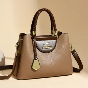 Elegant women's leather tote bag with braided handle and shoulder strap for daily use.