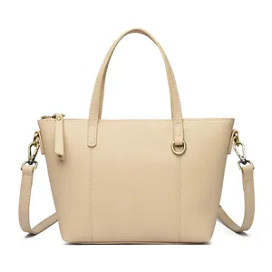 Beige minimalist women's handbag, stylish leather shoulder and crossbody bag for daily use.