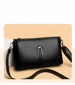 Classic black leather crossbody bag for women, stylish small square shoulder bag design.