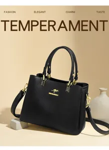 Detailed view of elegant black leather handbag with chic gold hardware and sturdy dual top handles.