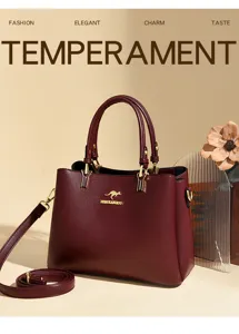 Elegant wine red leather handbag for women, stylish top handle crossbody bag with strap.
