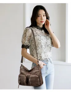 Elegante borsa a tracolla marrone da donna con tasche multiple e grande capienza quotidiana.