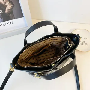 2025 new trendy women's black crocodile pattern bucket bag versatile retro shoulder bag.