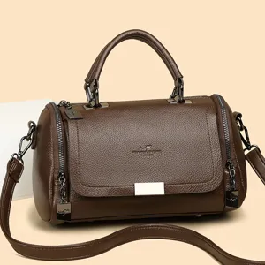 Brown leather handbag for women, stylish top handle shoulder bag with large capacity.