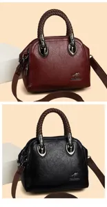 Chic dome handbag featuring braided top handles, structured multi-compartment design, elegant style.