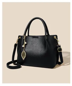 Elegant black women handbag soft leather top handle shoulder crossbody bag for daily use.