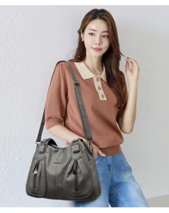 Large capacity women shoulder bag with soft leather, multi-zipper pockets and shoulder strap.
