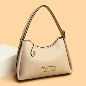 Elegant beige genuine leather shoulder bag for women, fashion hobo underarm handbag.