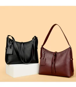 Detailed view of women casual leather shoulder bag, retro hobo handbag with large capacity.