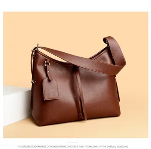 Detailed view of retro brown women shoulder bag, casual commuter handbag with strap.